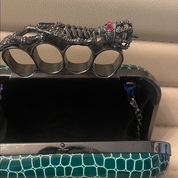 Elegant Green Clutch with Unique skeleton Handle - Picture 8 of 8